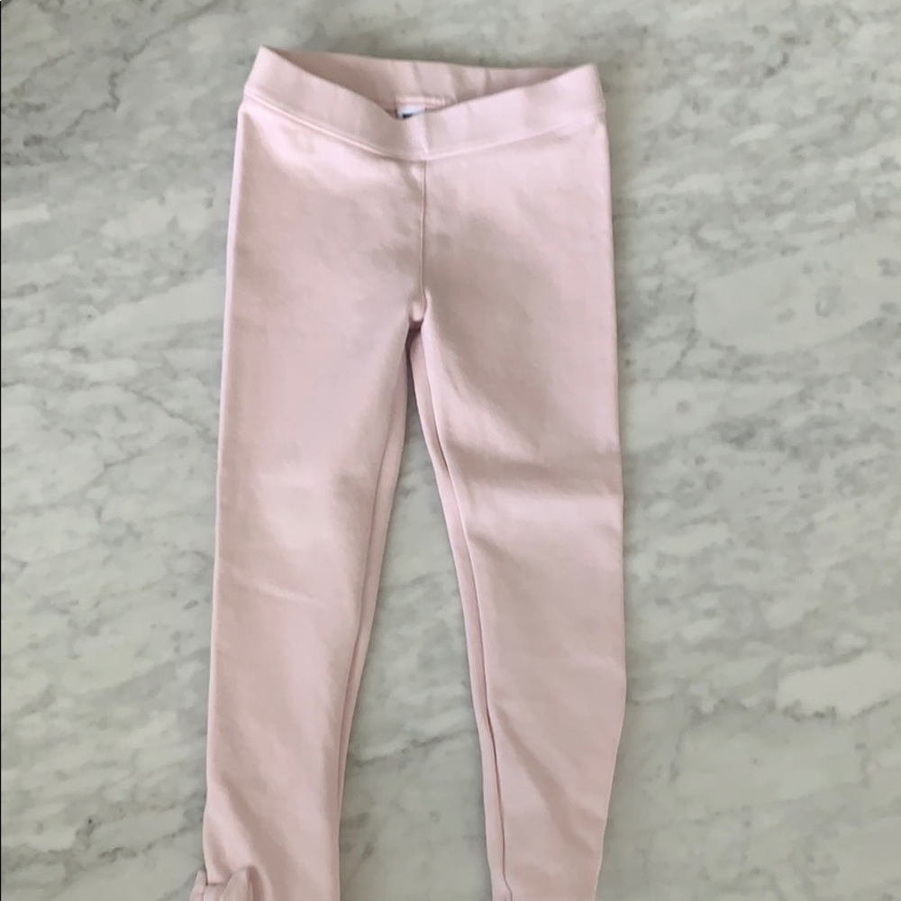 Pink leggings with bow details